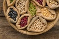 Legumes seed bean in sack bag on wooden background Royalty Free Stock Photo