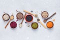 Legumes, seeds and cereals on a gray background. Healthy food. Top view