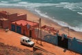 Legzira, Morocco - aerial view of Auberge Beach Club and the wild Atlantic Ocean coast on a sunny day.