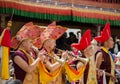 Monks playing traditional Ladakhi musical instruments and trumpets during the annual Hemis festival in Ladakh, India