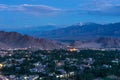Leh city at night in summer season surrounded by Himalaya mountains range in Ladakh region, Northern India Royalty Free Stock Photo