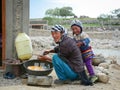 Tibetan woman with her son in Nubra, India Royalty Free Stock Photo