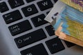 Lei banknotes on keyboard. Selective focus on stack of LEI romanian money Royalty Free Stock Photo