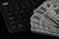 Lei banknotes on keyboard. Selective focus on stack of LEI romanian money Royalty Free Stock Photo