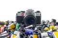 Leica R4 photo camera with used 35 mm film roll cartridges in front of a white background in Dieren, The Netherlands Royalty Free Stock Photo
