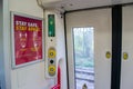 LEICESTER, ENGLAND- 3 April 2021: Coronavirus signage on a Crosscountry train amid the coronavirus pandemic Royalty Free Stock Photo
