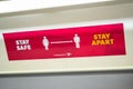 LEICESTER, ENGLAND- 3 April 2021: Social distancing signage on a Crosscountry train amid the coronavirus pandemic Royalty Free Stock Photo