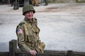 Man dressed in wartime US army soldiers uniform reenacting military maneuvers during Victory Day Europe Celebration Event