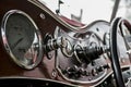 Polished wooden dash board on a vintage car at a classic car rally