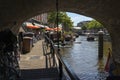 Walking path under the bridge over the Nieuwe Rijn canal