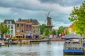 LEIDEN, NETHERLANDS, AUGUST 8, 2018: View of Beestenmarket and de Valk windmill in Leiden, Netherlands