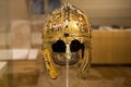 Leiden, The Netherlands - DEC 04, 2020: an ancient gilded silver equestrian helmet from a roman soldier.