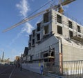 Leiden / The Netherlands - February 7 2018 - Construction workers building the new Lakenhal museum building design with a big Royalty Free Stock Photo