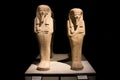 closeup of ancient shabtis, egyptian figurines.