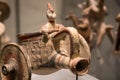 Leiden, The Netherlands - JAN 04, 2020: closeup of small terracotta warrior chariot figurine made from a jar from ancient Cyprus.