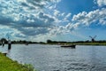 People on boat on dutch river