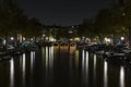 Leidsegracht bridge over Keizersgracht canal at night