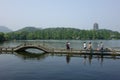 Leifeng Pagoda with stone bridge in West Lake Royalty Free Stock Photo