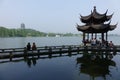Leifeng Pagoda with stone bridge in West Lake Royalty Free Stock Photo