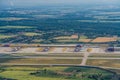 Leipzig, DHL cargo hub with main cargo apron, main buildings and hangar and many cargo airplanes parked on apron - aerial view Royalty Free Stock Photo