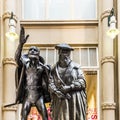 Sculpture of Mephistopheles bewitching the students in the scene Auerbachs Keller from Faust at the entrance of Auerbachs Keller Royalty Free Stock Photo