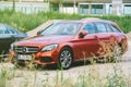 Two Mercedes-Benz C-Class W205 black sedan and red station wago Royalty Free Stock Photo