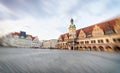 LEIPZIG, GERMANY - JULY 17, 2016: Tourists visit Marketplatz at sunset. Leipzig attracts 3 million tourists annually