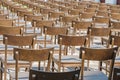 Commemoration memorial to the holocaust of Jews: art installation of empty chairs at city street Royalty Free Stock Photo