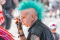 Expressive punk metalhead with a haircut Iroquois at the Annual Leipzig festival