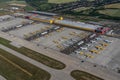 Leipzig, DHL cargo hub with main cargo apron, main buildings and hangar and many cargo airplanes parked on apron - aerial view Royalty Free Stock Photo