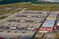 Leipzig, DHL cargo hub with main cargo apron, main buildings and hangar and many cargo airplanes parked on apron - aerial view Royalty Free Stock Photo