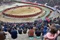 LEISHAN, GUIZHOU PROVINCE, CHINA Ã¢â¬â CIRCA DECEMBER 2017: Audience on the well known water buffalo fight. Royalty Free Stock Photo