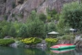 Water attraction trampoline in the mountain pool