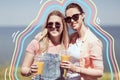 Teenage girls or friends with drinks in summer Royalty Free Stock Photo