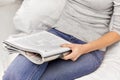 Close up of woman reading magazine at home Royalty Free Stock Photo