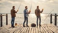 leisure and people concept - male friends fishing and drinking von sea pier