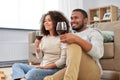 African american couple drinking wine at home Royalty Free Stock Photo