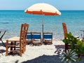 Leisure Pink  Straw Umbrellas And Wooden Deck Chairs Wooden Table On The Bed Blue Sky  , White Sand On Beach Summer
