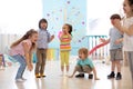 Leisure of preschool children. Acting and developing games for kids in kindergarten Royalty Free Stock Photo