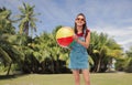 Smiling teenage girl in sunglasses with beach ball Royalty Free Stock Photo