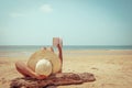 Young woman in straw hat lying sunbathe on a tropical beach Royalty Free Stock Photo