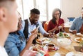 Happy friends with smartphones at restaurant Royalty Free Stock Photo