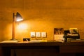 Leisure working desk under a glowing lamp