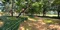 A leisurely afternoon in a park painted as a panorama