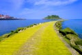 Lekeitio village with San Nicolas island and pier with moss Royalty Free Stock Photo