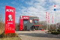 Car park near Dutch motorway with KFC fastfood restaurant