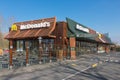 Exterior of modern Mc Donald`s fastfood restaurant with drive-thru