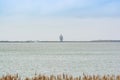 Lelystad, Netherlands - January 09, 2020. Antony Gormley Exposure Statue - huge statue sitting on the coast of Markermeer