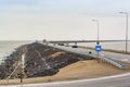 Lelystad, Netherlands - January 09, 2020. Embankment by road N307 splitting Markermeer and IJsselmeer