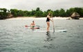 LEMBONGAN - JANUARY 5 : people row on the surfboards on JANUARY